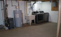 furnance, laundry tub, washer and dryer